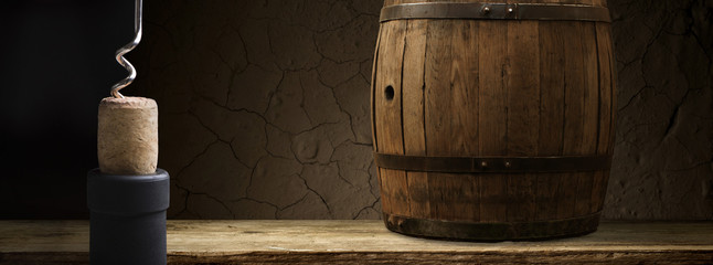 Old wooden barrel on a brown background