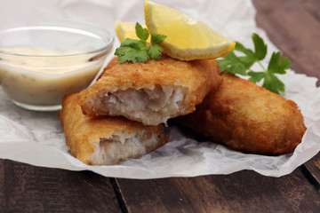 traditional British fish on wooden background