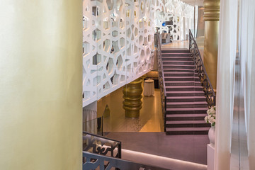 Hotel lobby interior with stairs