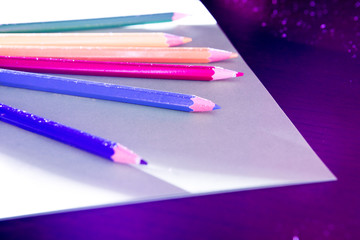 Naklejka premium Colorfully Illuminated Colored Pencils