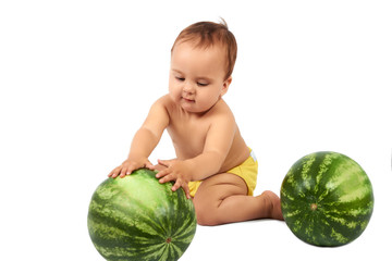 Fototapeta premium Cute little infant baby girl eating watermelon slice on white background