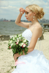 Fototapeta na wymiar Bride with bouquet