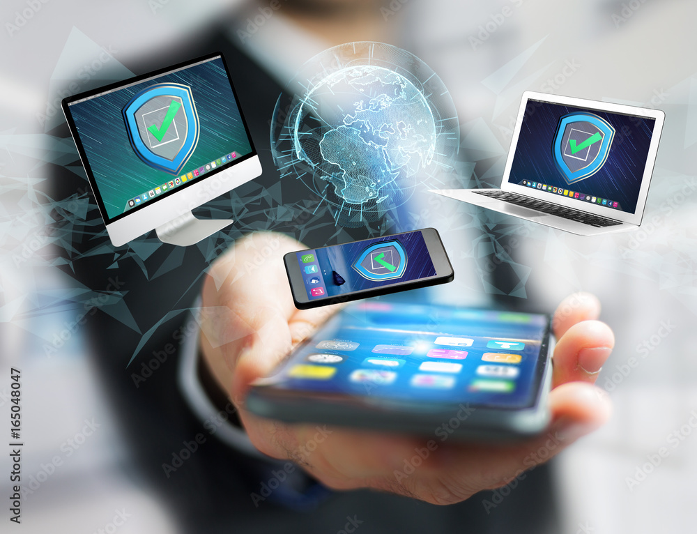 Poster security shield symbol over a network connection of different devices - technology concept
