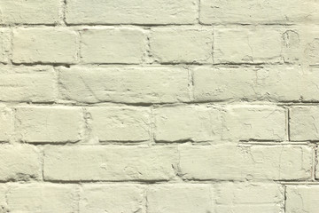 brick wall covered with  yellow lime