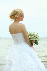 Fototapeta na wymiar Bride with bouquet