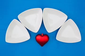 Red heart and triangular ceramic bowls