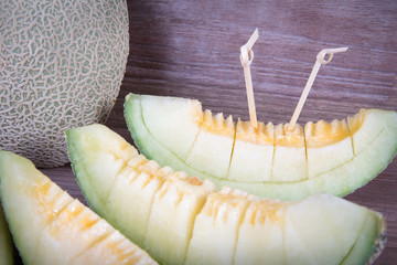 melon on wood background