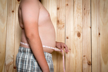 Fat boy, The size of stomach of children with overweight.