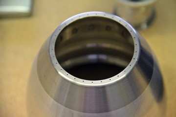 Part of broken Electrostatic Bell for automatic spray