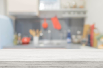 Stone table top and blurred kitchen interior background - can used for display or montage your products.