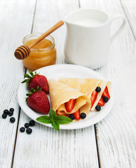 crepes with strawberries and blueberries