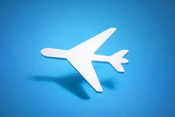 Airplane shape over blue background 