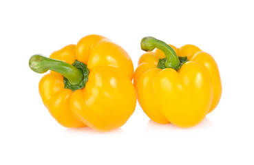 Obraz na płótnie Canvas whole fresh yellow bell pepper with stem on white background