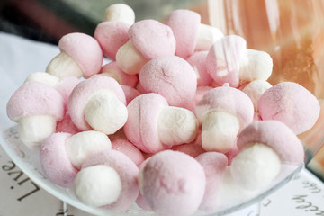 pink and white marshmallows in bowl