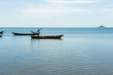 Naklejka na ściany i meble Fishing boat in the sea