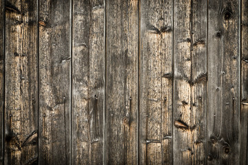 Natural brown barn wood wall. Wooden textured background pattern.