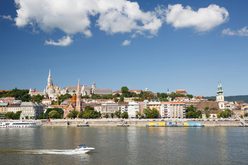 Fototapeta premium view across the River Danube towards the Fisherman's Bastion in Buda District on a summer