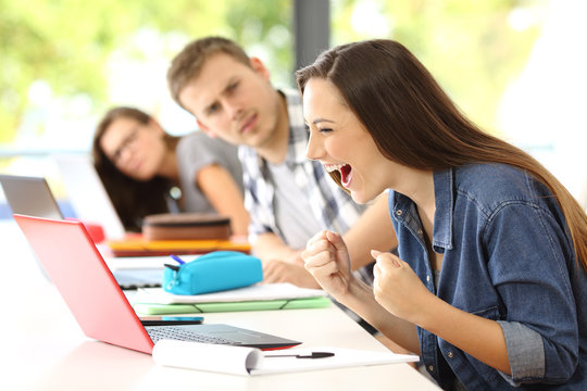 Excited student on line in a classroom