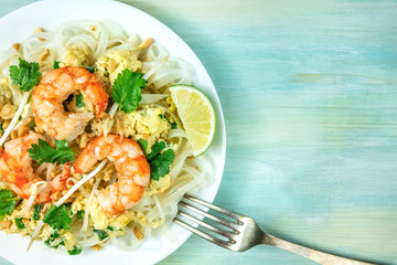 Shrimp Pad Thai closeup from above with copy space