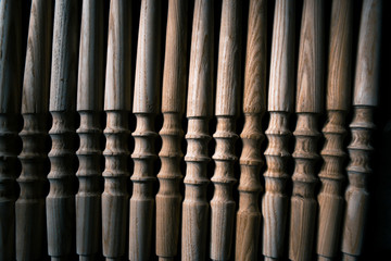 Wooden fragment ornament for shisha decoration on a wooden background.