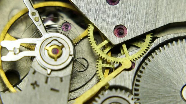 Mechanism Stopwatch Closeup, clock inside gears background, vintage technology. 