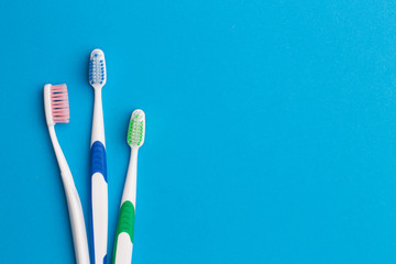 Colorful toothbrushes, place for inscription