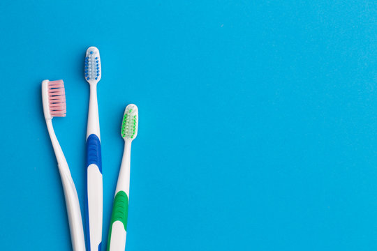 Colorful toothbrushes, place for inscription
