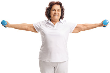 Elderly woman exercising with small dumbbells