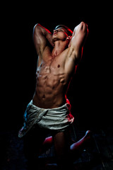 Adam with glitter on bare chest.