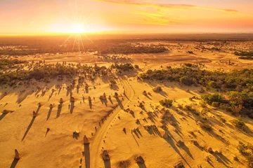 Zelfklevend Fotobehang Aerial view of the sun setting over the Pinnacles Desert, Western Australia © Alex