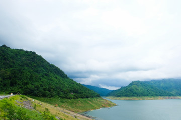 Dam scene with cloudy sky.