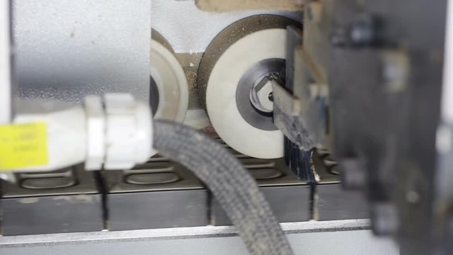 Close up at industrial belt in machine.