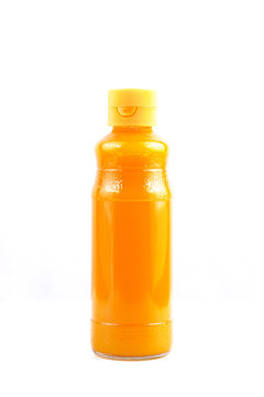 Mango juice glass bottle. Isolated on white background