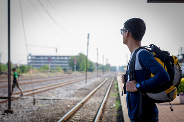 Fototapeta premium Tourists man are enjoying the train station.