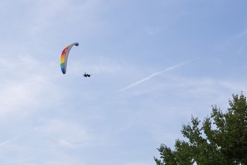 Paraglider flying in the air during colorful sunset. Slovakia