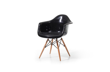 Modern black plastic chair with wooden Legs
