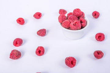 Fresh raspberry in a cup