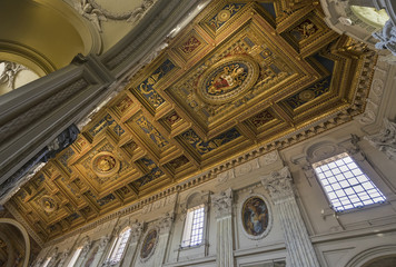 The ceiling with gold details in Basilica di San Giovanni in Lat