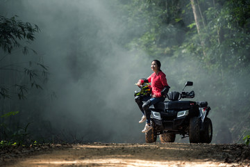 Woman going on a jungle zip line adventure, asia