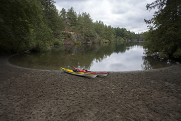Two sea kayaks at Thetis lake