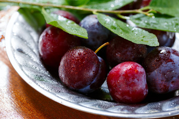 Plums in the dish