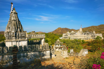 Fototapeta na wymiar Ranakpur Jain Temple view from the hill with old hindu cenotaphs, Ranakpur city, Rajasthan, India, Asia.