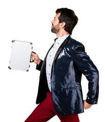 Man with jacket holding a briefcase