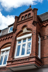 Old brick facade of the house