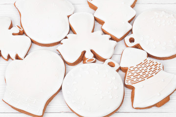 White glazed Christmas cookies background. Top view. Flat lay