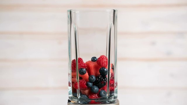 berries appear in a blender