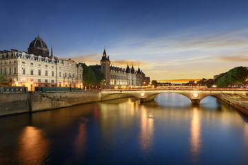 Fototapeta na wymiar Boat tour on Seine river in Paris with sunset. Paris, France