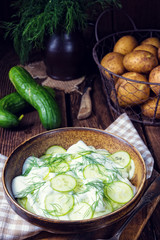 fresh cucumber salad with yogurt and young potatoes