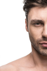 Obraz premium portrait of young handsome man looking at camera, isolated on white