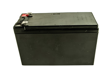 Close up of a generic black car battery isolated on white background